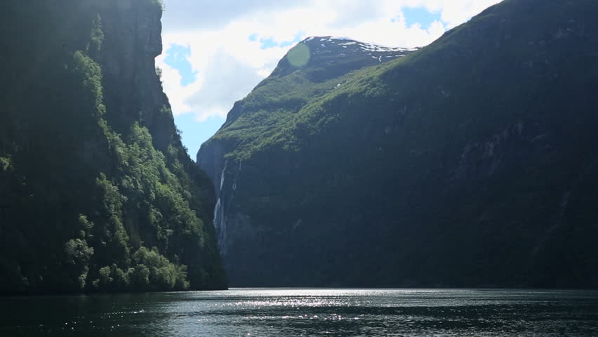 Norwegian fjords in  background the famous Seven Sisters Waterfall at