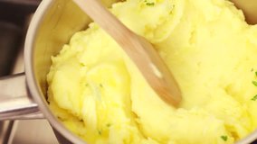 Butter being added to mashed potatoes - Powered by Shutterstock - Get 15% off with code: PIKWIZARD15