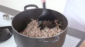 Onions and minced meat being fried