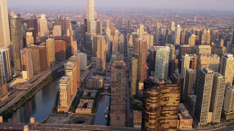Aerial sunrise view downtown Chicago River, skyscrapers, Trump Tower, marina district, Chicago, Illinois, USA, shot on RED EPIC