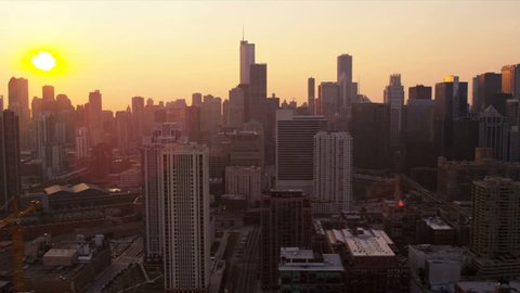 Aerial low level sunrise city view of Chicago skyline downtown financial district, Chicago, Illinois, USA