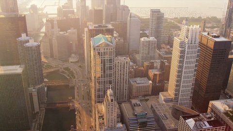 Aerial sunrise view Chicago city skyscrapers, Chicago River, Chicago, Illinois, USA, shot on RED EPIC Stock Video