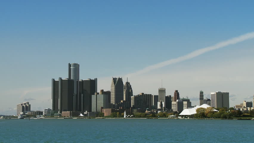 Panning from the skyline of Detroit, Michigan, USA, to Windsor, Ontario, Canada,