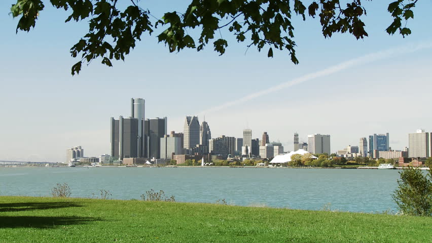 Skyline of Detroit, Michigan, with Detroit River in the foreground.