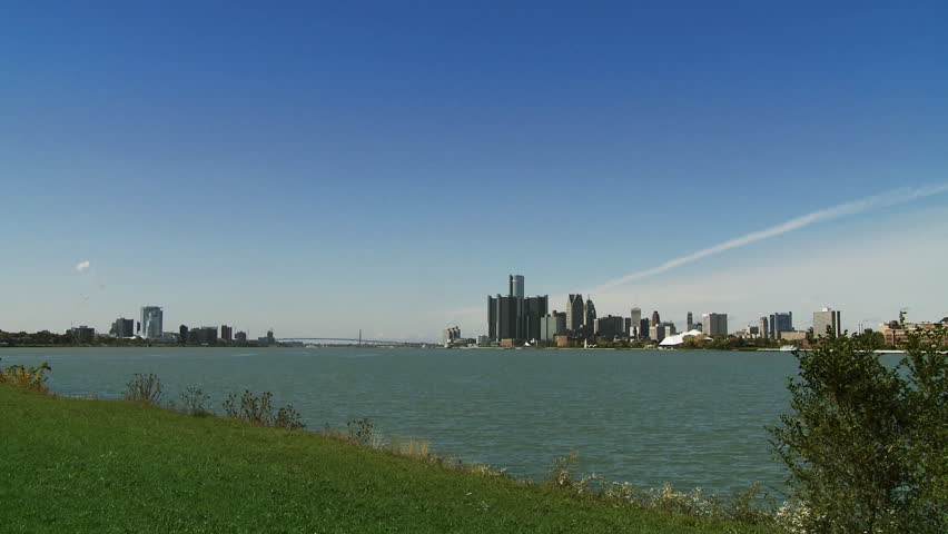 Locked off shot of the skylines of Detroit, Michigan, USA, and Windsor, Ontario,