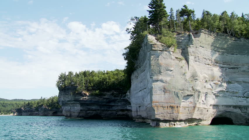 Passing the cliffs at Pictured Rocks National Lakeshore park, Michigan's Upper