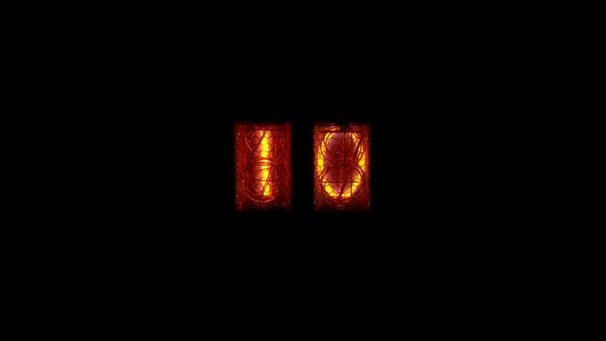 Detail of Nixie tubes counting down from ten seconds to zero against a black