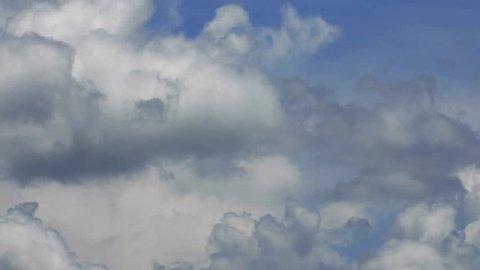 Dramatic Boiling Cumulus Clouds against blue sky HD time lapse