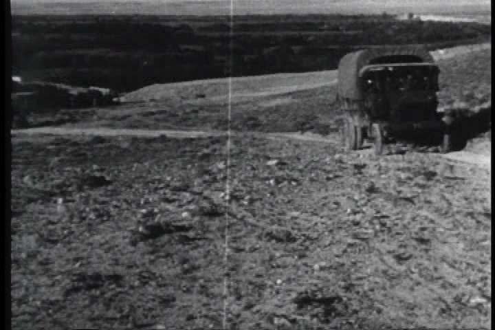 1910s - A convoy of military automobiles runs into trouble on the way to San Francisco during the 1910s