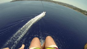 Parasailing, Parascending - Extreme Sports, wide angle shot High Definition Video - legs up