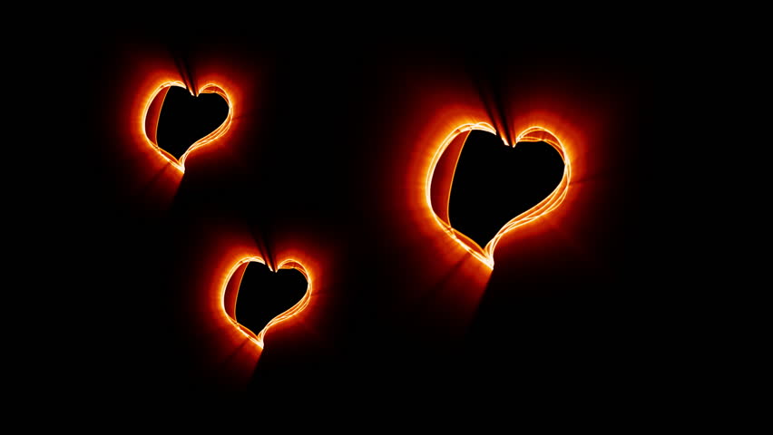 Three bouncing heart shapes made of fire-like glowing lines.  Clip created by