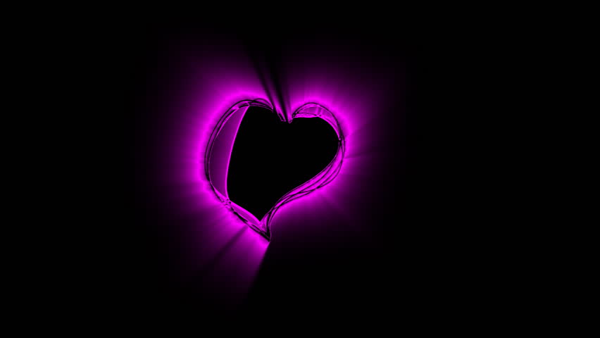 Bouncing heart shape made of glowing pink lines.  Clip created by recording live