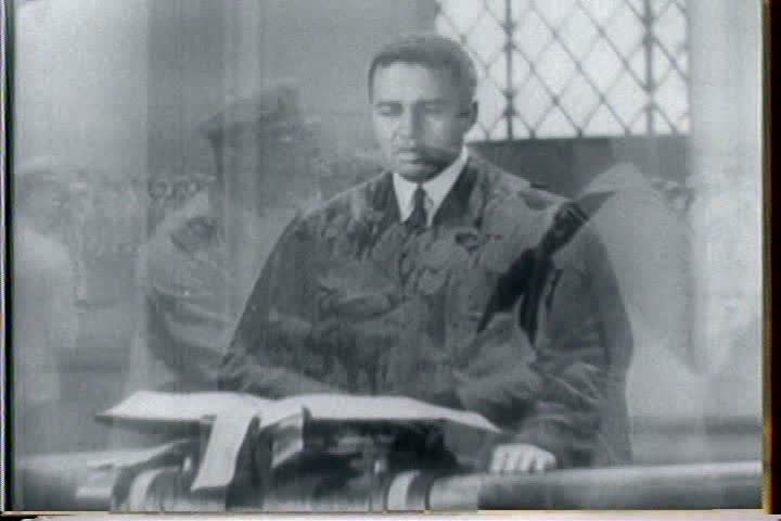 1940s - An African American priest presides over a church service to honor black soldiers in World War Two.
