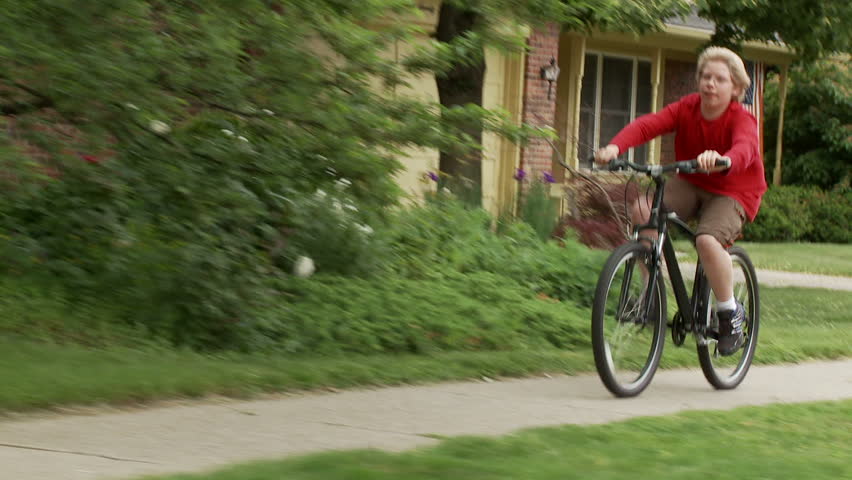 riding bike on sidewalk