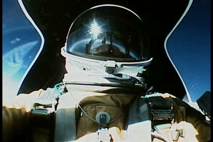 1970s - An Airforce pilot prepares for a reconnaissance mission during the 1970s