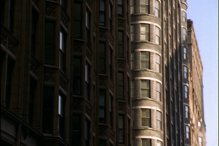 CHICAGO - MAY 13, 2001: Tilt up front of Fisher Building to blue sky.