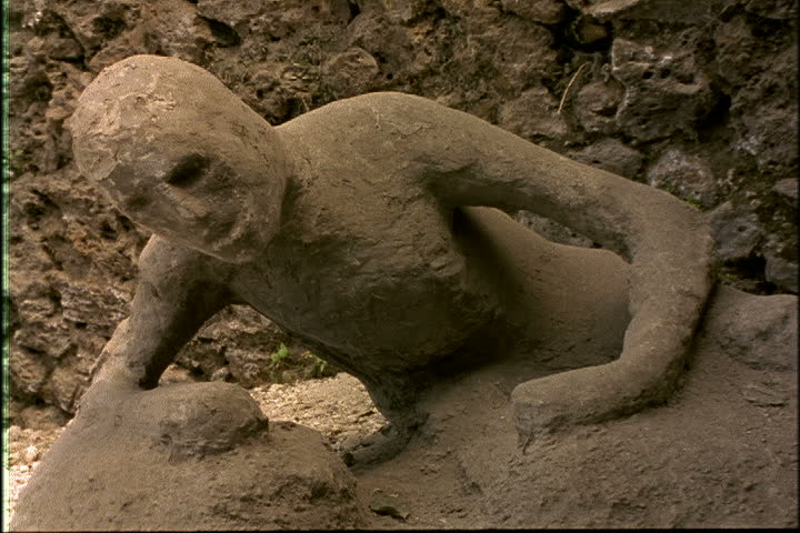 Plaster cast of victim of Mount Vesuvius eruption in Garden of the Fugitives, Naples, Italy.