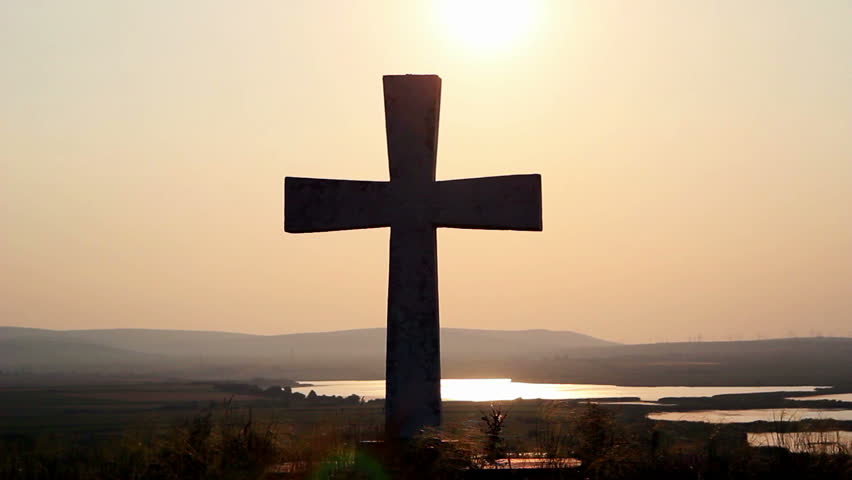 Cross on top of the hill landscape (timelapse)