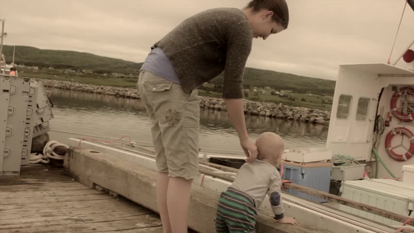A mother and baby on a lobster fishing boat