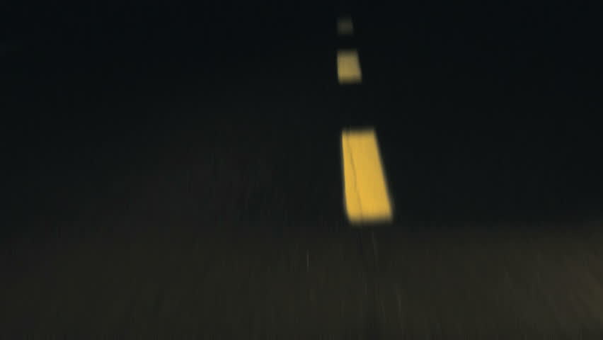 Close-up of road in the darkness