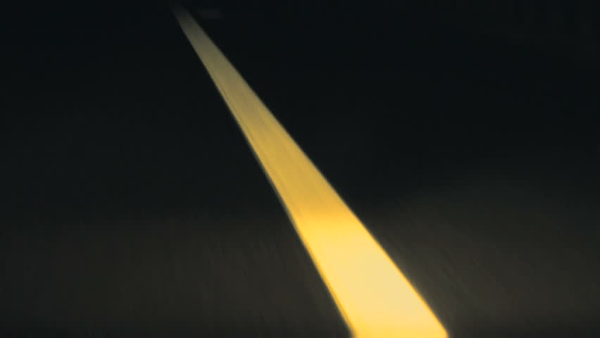 Close-up of road in the darkness