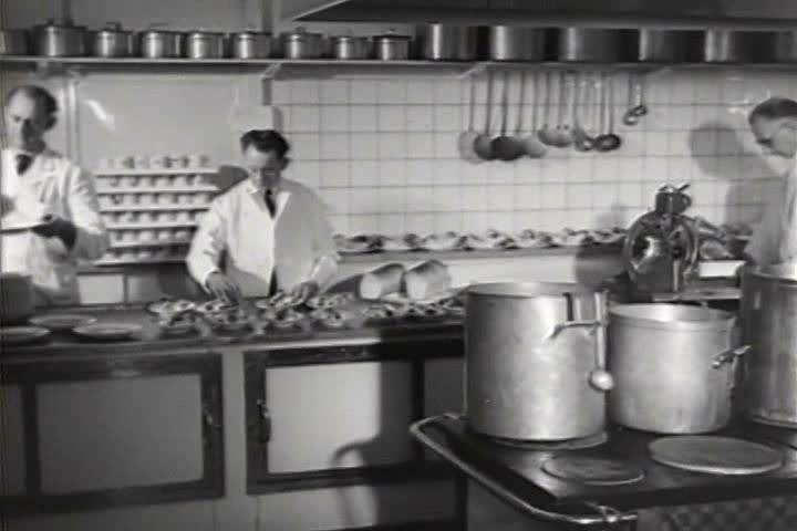1940s - Very nice conditions in the Ford factory in Amsterdam, Holland in 1948 and shots of Amsterdam.