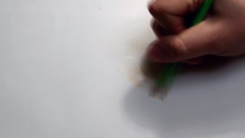 Hand draw a heart on white paper