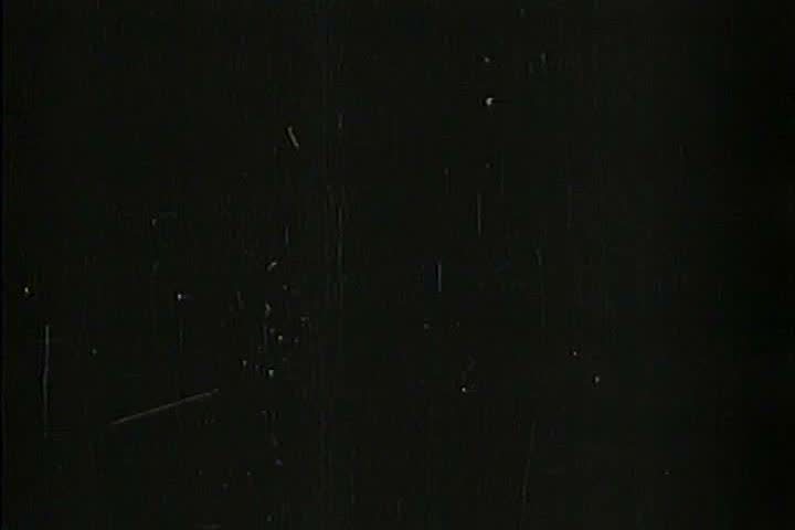 1940s - Captured Italian war film from 1941 shows Italian motorized columns, cavalry, artillery, and pack mules move through a Yugoslavian town and the Italian flag flies in victory.