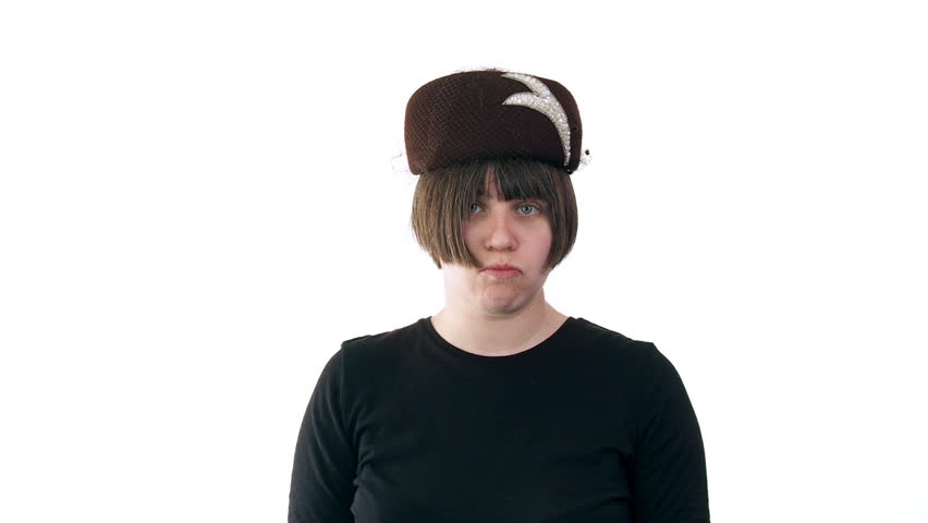 Young woman tries on various hats, cut together with many different hats