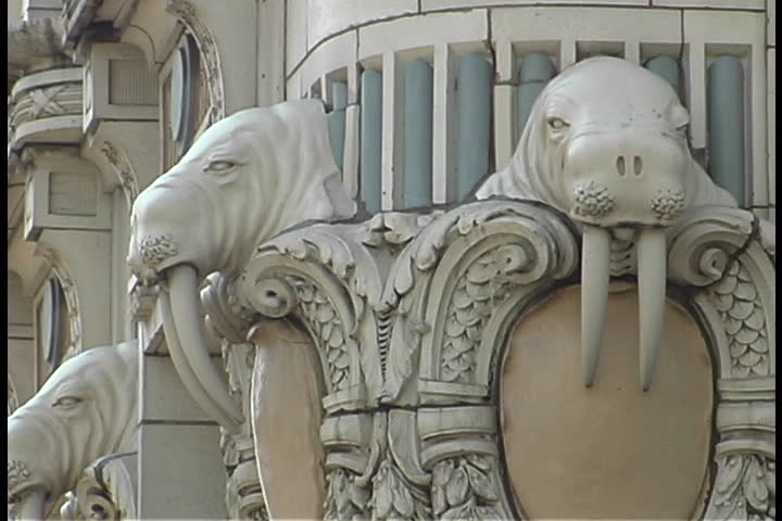 Close up of walrus gargoyles that line the sides of the Arctic Building in Seattle, Washington.