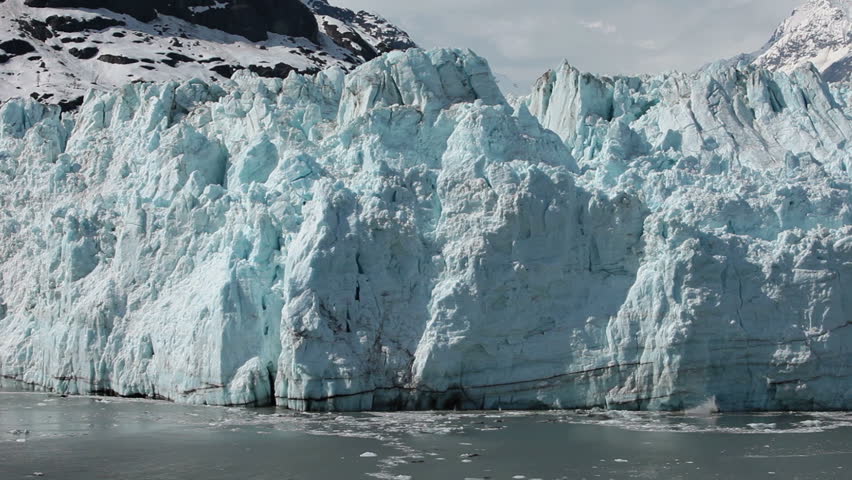 Margerie Glacier tidewater calving Glacier Bay slow motion. 21 mile long and a mile wide tide water glacier in National Park, Alaska.  One of the most active glacier for Calving. Geology environment. Royalty-Free Stock Footage #4301657