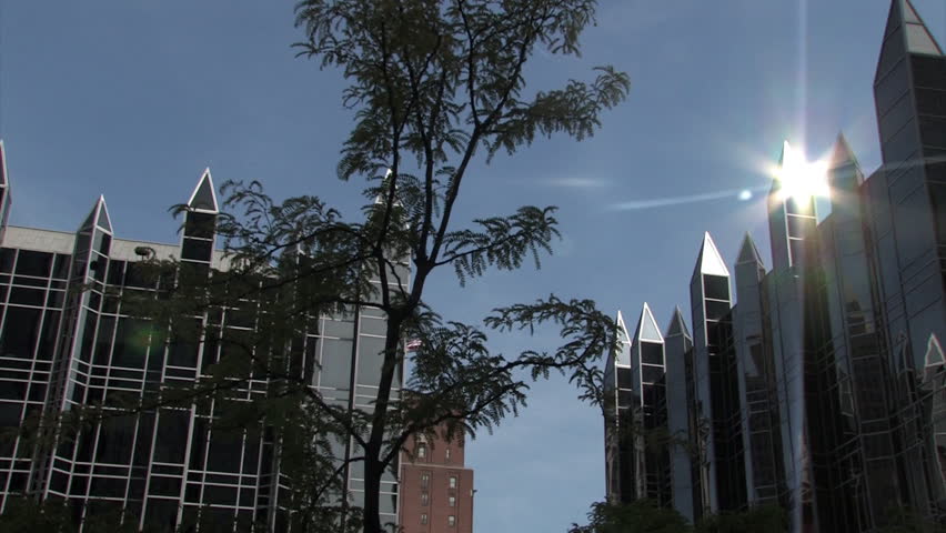Sun reflects off the spires atop PPG Place in downtown Pittsburgh, Pennsylvania.