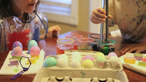 Kids Coloring Easter Eggs as a Holiday Tradition Stock Video