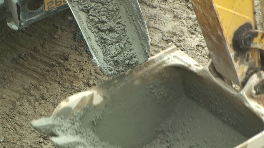 Concrete poured into scoop