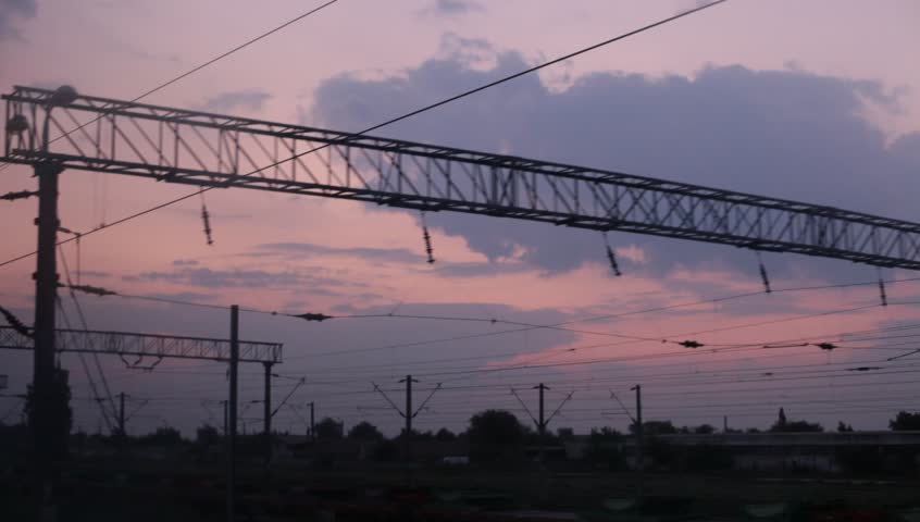 Travel motion backgrounds. Railways wagon window view at sunset with dramatic cloudy sky.
 | Shutterstock HD Video #4309094