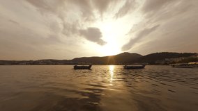 Lake of Kastoria, South side at Sunset,  Greece - HD Timelapse video - ultra wide view
