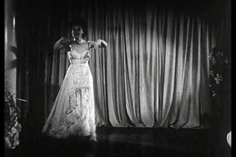 1930s - Georgia Southern performs an erotic burlesque striptease in this 1930s stag film.
