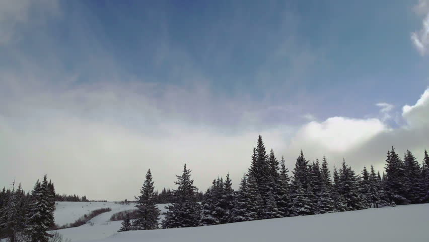 Long time lapse of clouds over Alaskan landscape