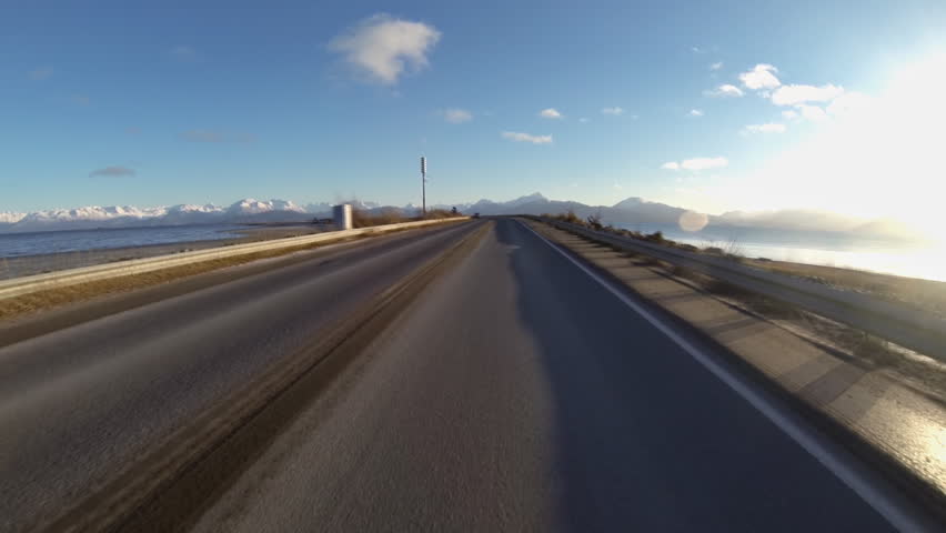 Driving POV on isolated Homer Spit Road, Homer, Alaska
