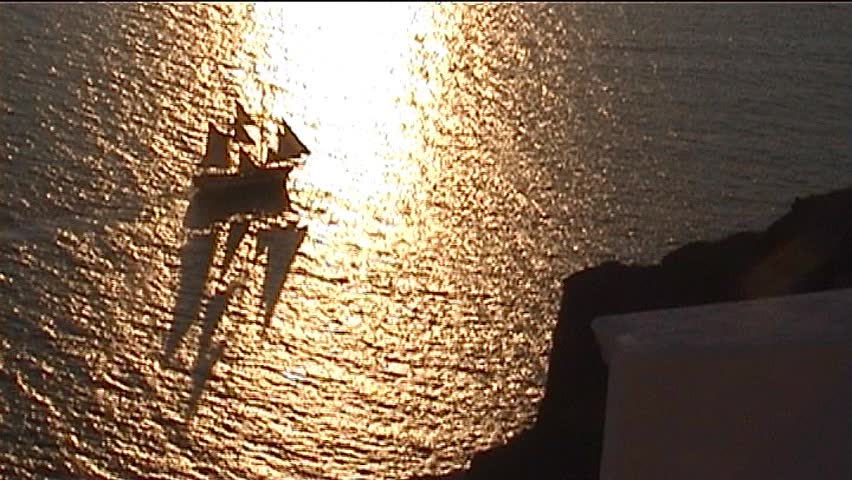 Greece, Santorini island, boat full of tourists to see sunset