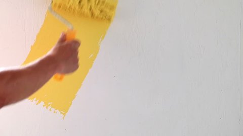 Painting wall in yellow color