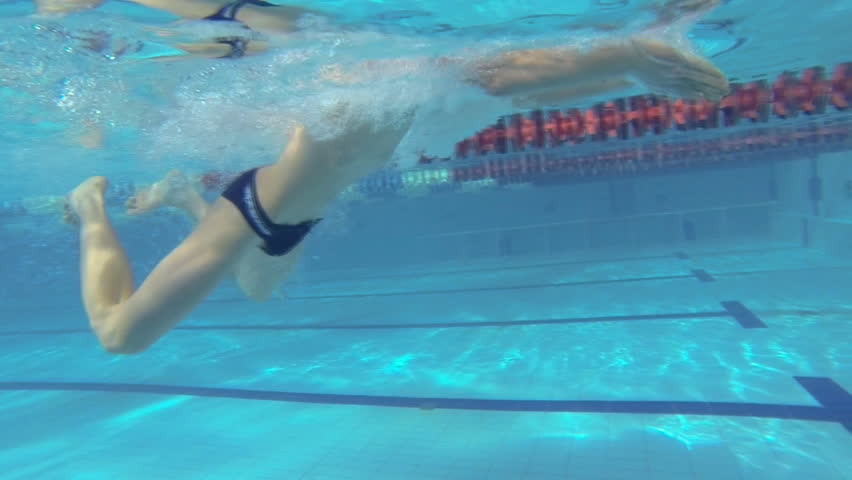 Beautiful underwater slow motion view of swimming breaststorke style