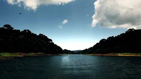 Tracking shot of a lake, Periyar Lake, Thekkady, Kerala, India