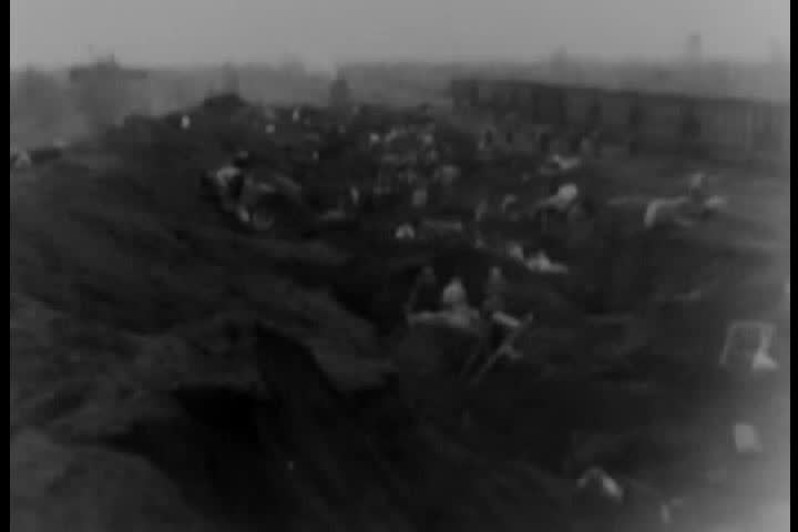1930s - Poor people in Gary Indiana forage in a coke dump in 1931.