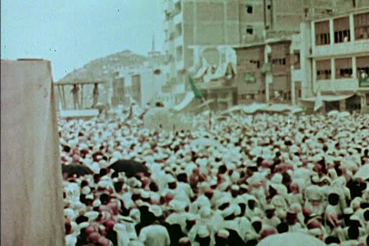 1970s - Muslim pilgrims, including King Faisal, visit Mecca, Saudi Arabia in 1973.