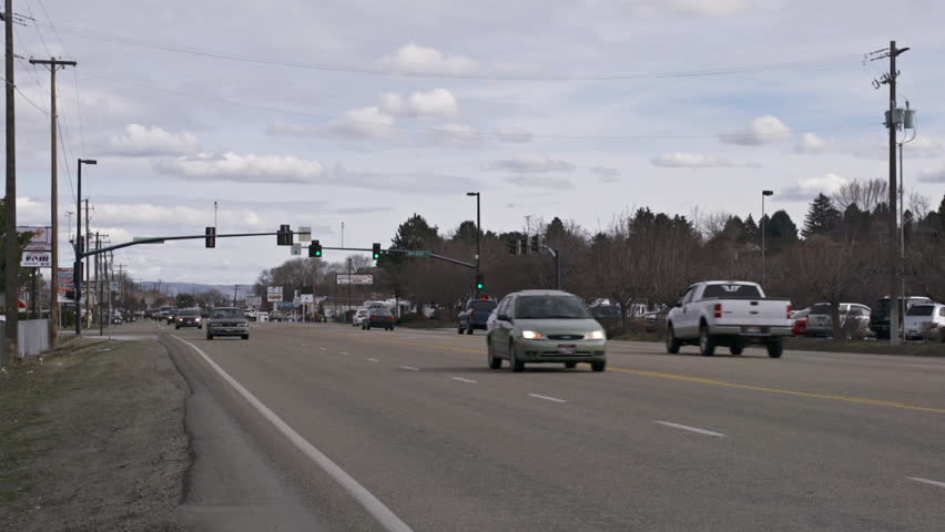 BOISE, ID - MARCH 2013 - Cars and trucks drive on Chinden Boulevard on a bright