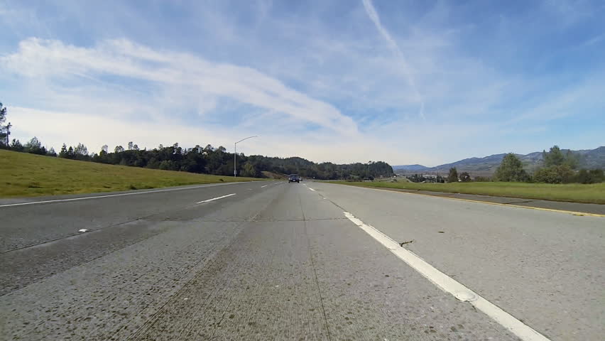SANTA ROSA, CA - FEBRUARY 2013: Passenger car drives past on Highway 101