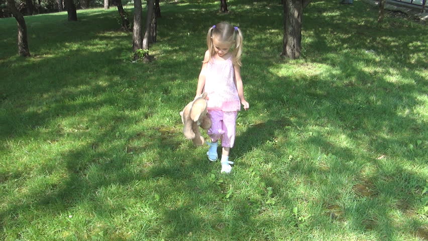 POV Playing Child Holding a Teddy Bear Walking in Forest, Girl Find a Playground