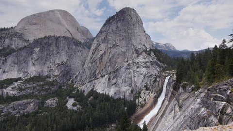 a wide angle view of nevada falls, half dome and liberty cap in yosemite national park, california