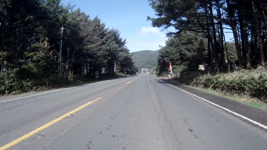 YACHATS, OR - UNKNOWN - View of drive north along the ocean on Highway 101 on a
